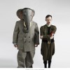 Publicitity image for Ganesh Versus the Third Reich, featuring the elephant god in a suit and a man dressed as Hitler.